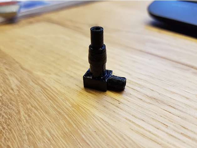 Headlamp-Leveling Vacuum Coupling